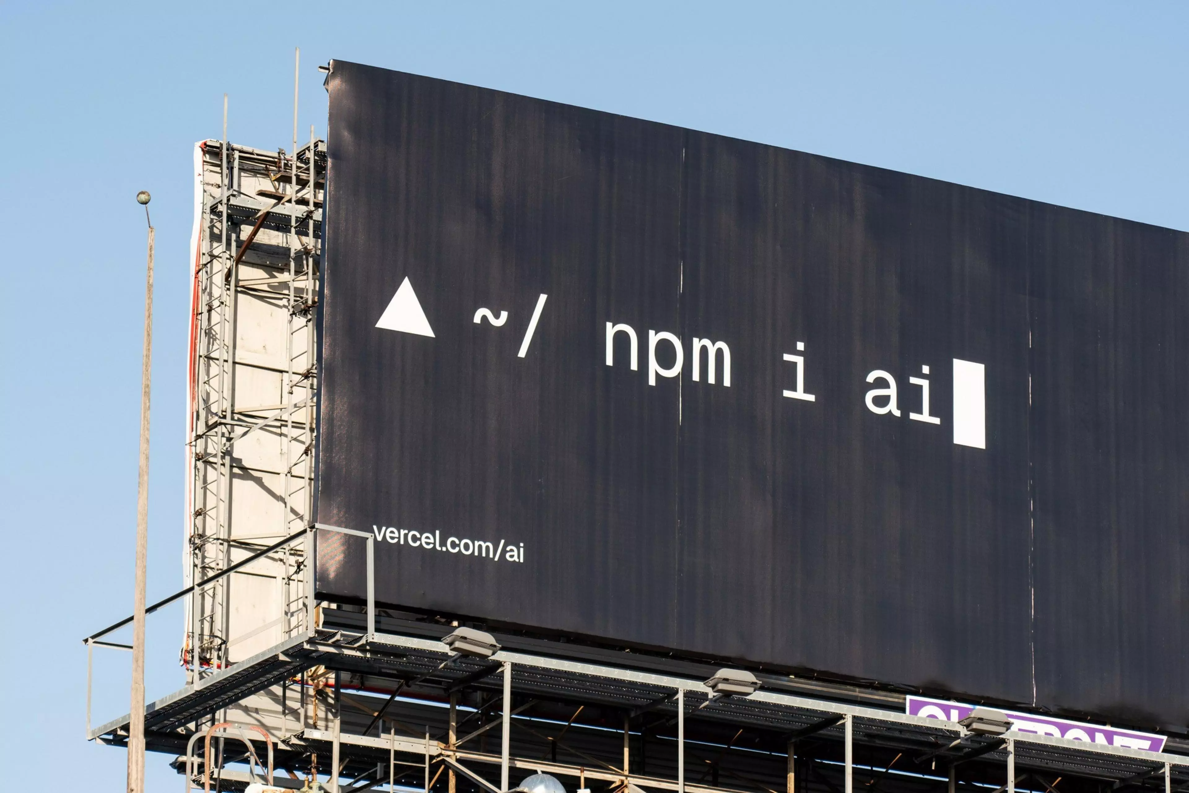 A billboard advertising Vercel's AI SDK styled as an npm package page